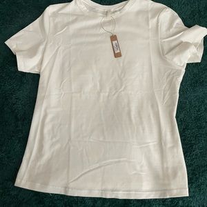 skims large marble t shirt. Casual. Slightly cropped. Skin tight. Thick fabric